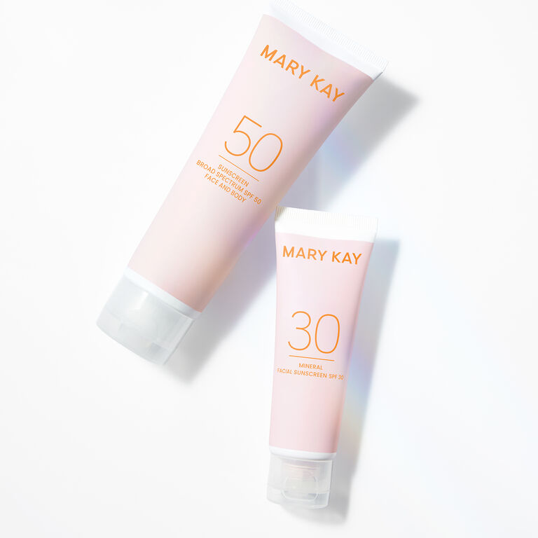 Mary Kay sunscreen tubes labeled SPF 50 and SPF 30 displayed on a white surface.